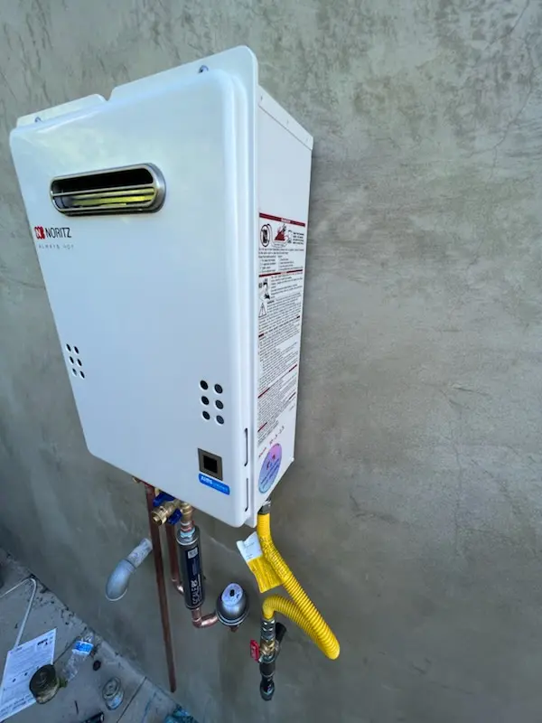 Tankless water heater installation for Candler-McAfee homes